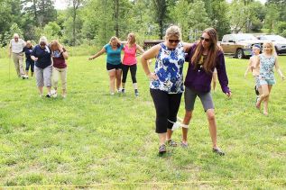 Three-legged races are usually thought of as kids’ events, but not in Arden last Saturday as “kids” of all ages got in on the action. Photo/Craig Bakay